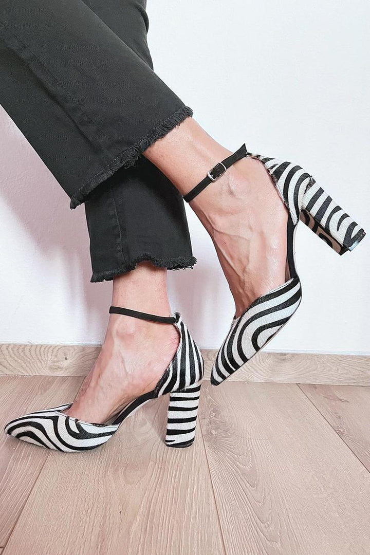 Calyra | Zebra Pumps